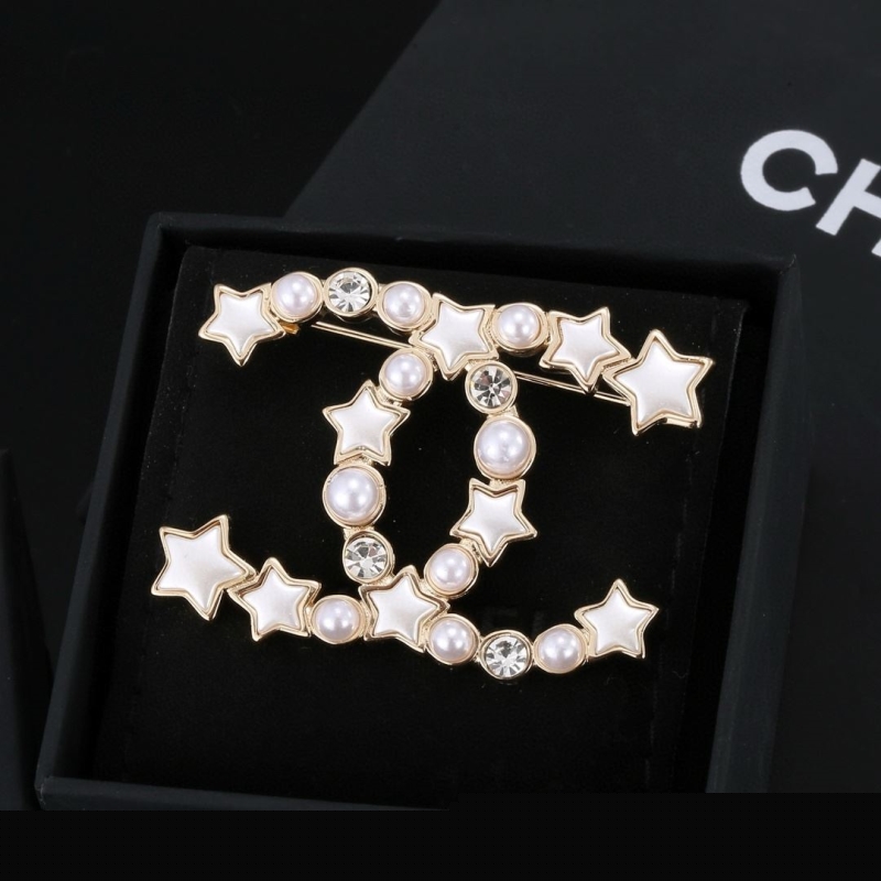 Ch*el brooches